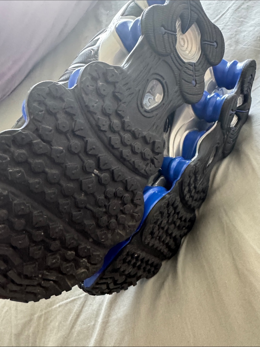 Nike Black Sneakers with Blue Accents and Cushioning Pods - Picture 6 of 8
